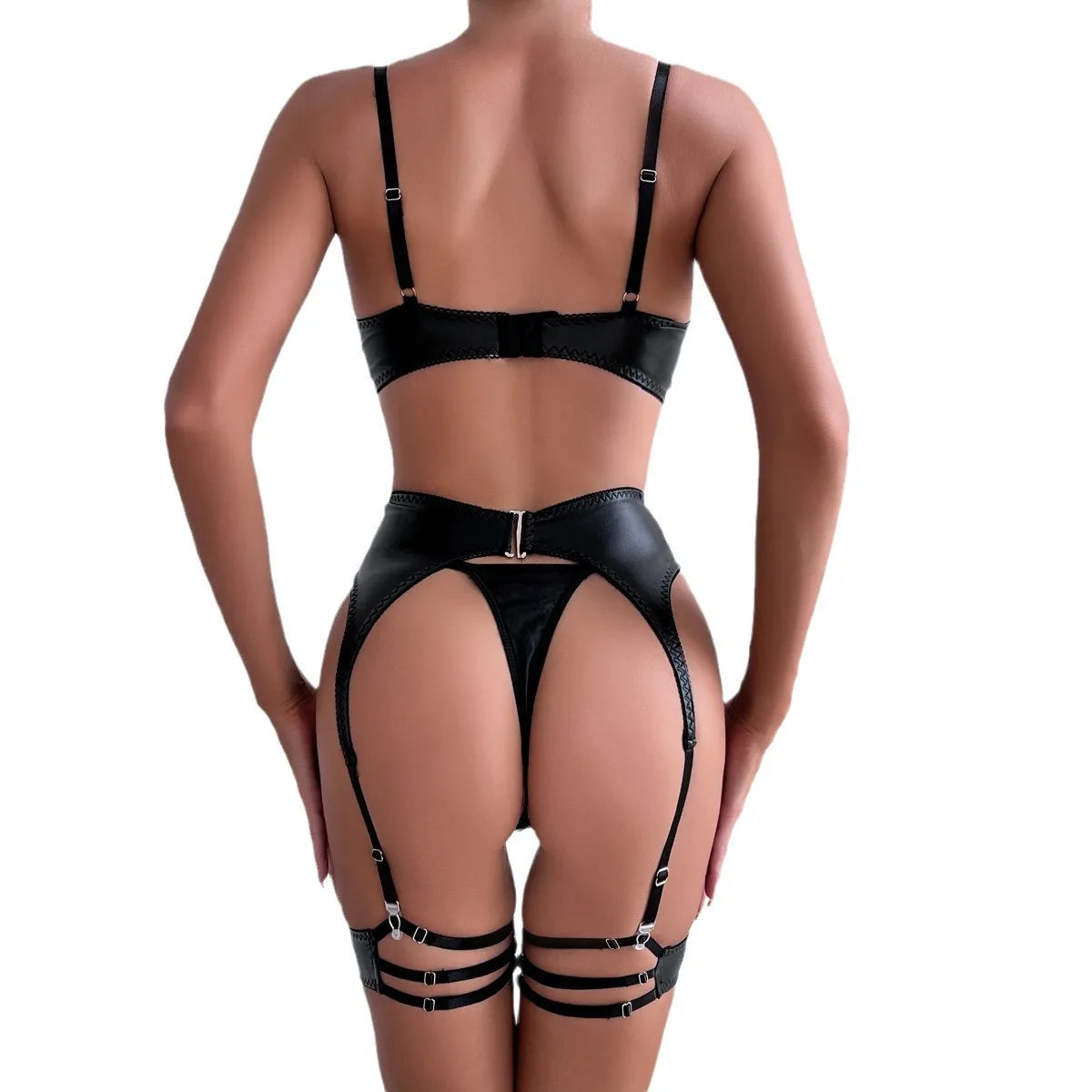 Effortlessly exude confidence and sensuality with our Sexy Leather Lingerie. Made from high-quality leather, this lingerie features a sleek and alluring design that flatters every body type. Perfect for adding a touch of boldness to your intimate wardrobe, our lingerie is sure to make you feel empowered and irresistible.