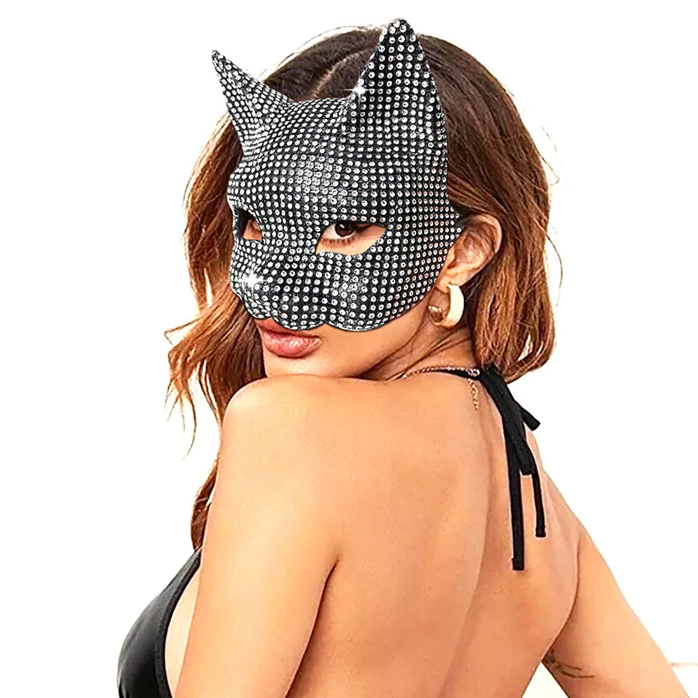 Enhance your feline ferocity with our Sexy Bling Kitten Half Masks. Made with high-quality materials, these masks add a touch of glamour to any costume. With intricate designs and sparkling jewels, you'll be the center of attention at any masquerade or Halloween party.