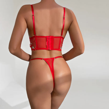 Expertly crafted with intricate red embroidery and a see-through design, this cherry underwire bra offers both style and support. The delicate detailing adds a touch of elegance while the underwire ensures a comfortable fit. Perfect for any occasion, this bra provides both fashion and function.
